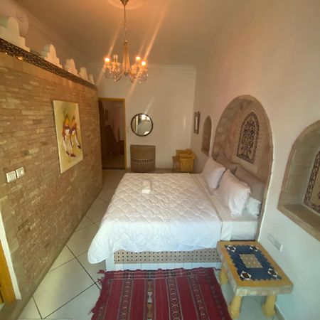 Pasta Plaza Hotel Asilah Bagian luar foto