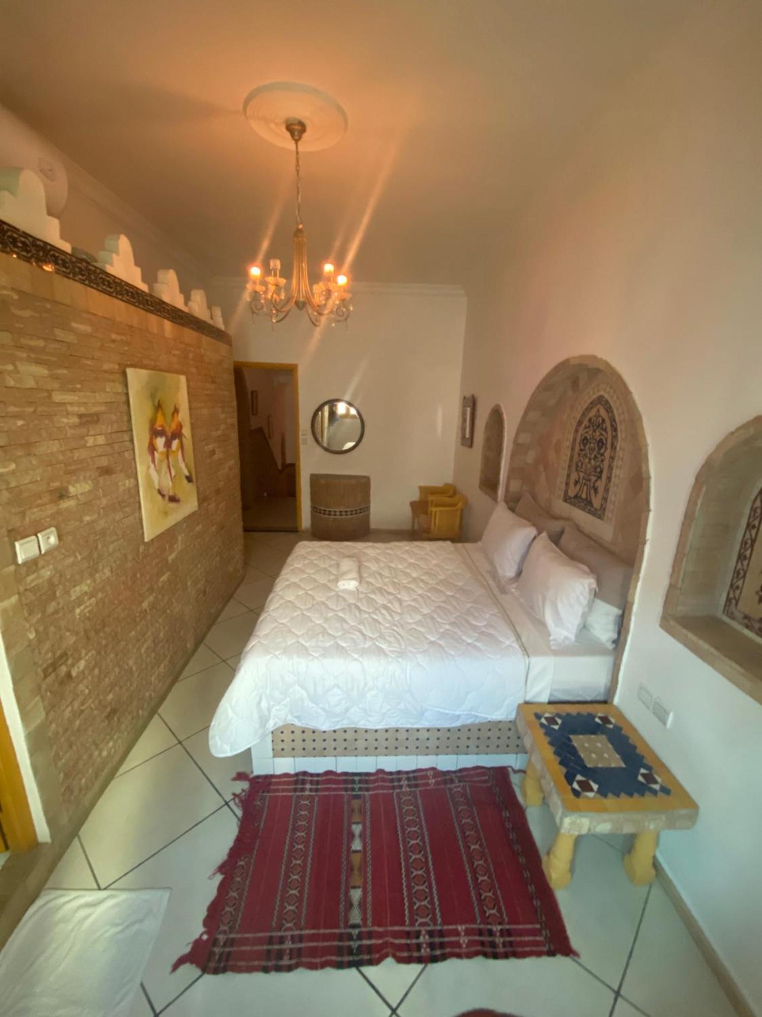 Pasta Plaza Hotel Asilah Bagian luar foto
